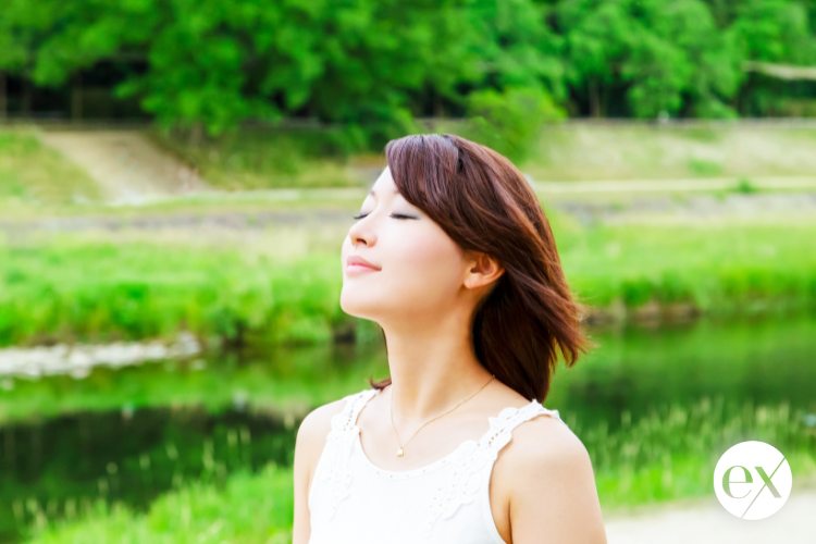 women-relaxed-breathing-with-eyes-closed