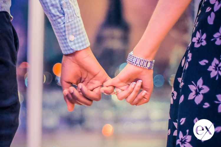 hand-holding-wondering-if-real-relationship-or-rebound-after-divorce